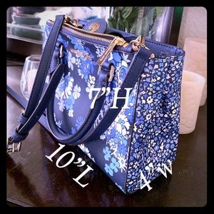 Authentic MK crossbody purse , new .